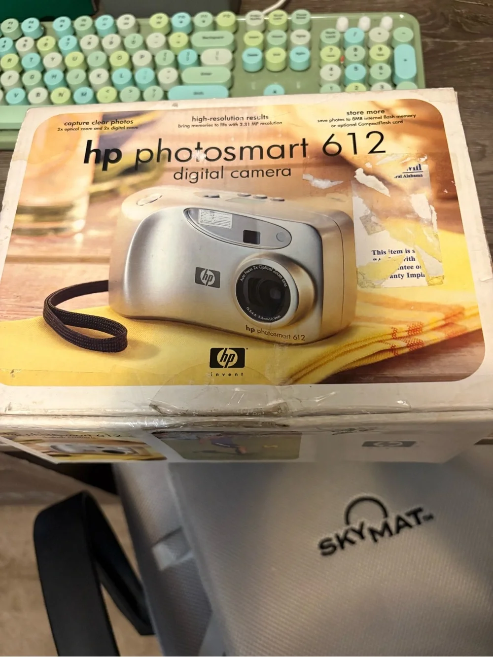 HP Photosmart 612 Digital Camera in Silver with Black Wrist Strap